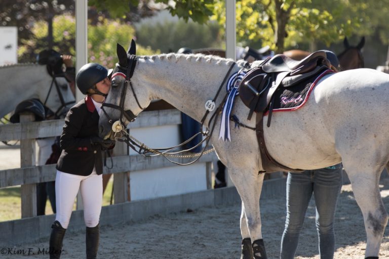 Jamie Barge gives her long time GP partner Luebbo a well-deserved kiss after finishing third
