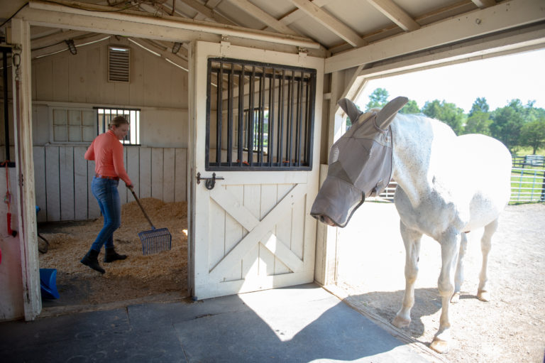 Liv Gude Cleaning a Stall 366
