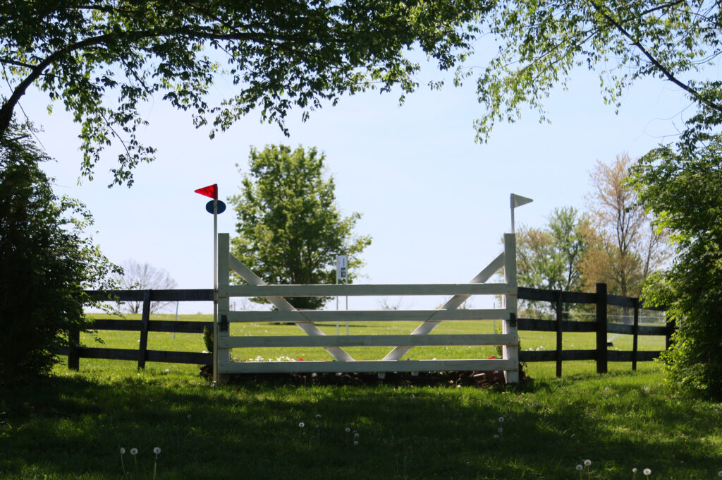 8 Fox's Den Gate - a straightforward but upright gate in the trees that requires the horse's attention. ©Alana Harrison