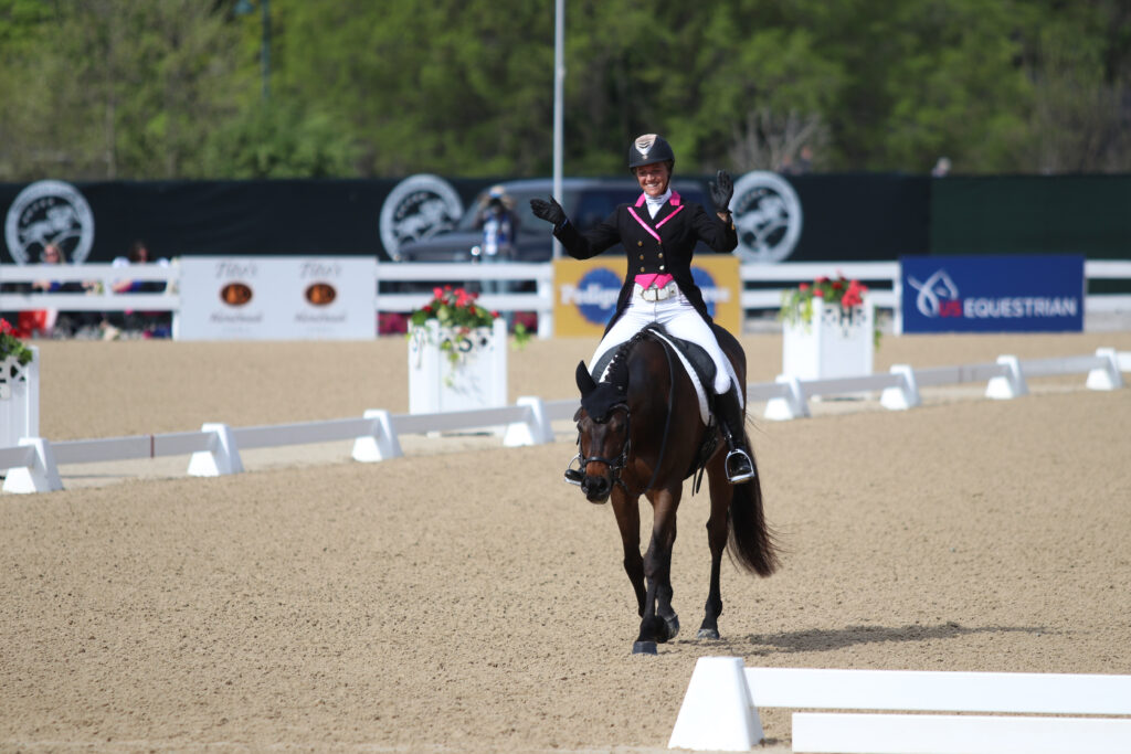 Ali Kuhn celebrates after her dressage test with Little Hail in the Cosequin® Lexington CCI4*-S division at the Defender Kentucky Three-Day Event. ©Kathleen Landwehr